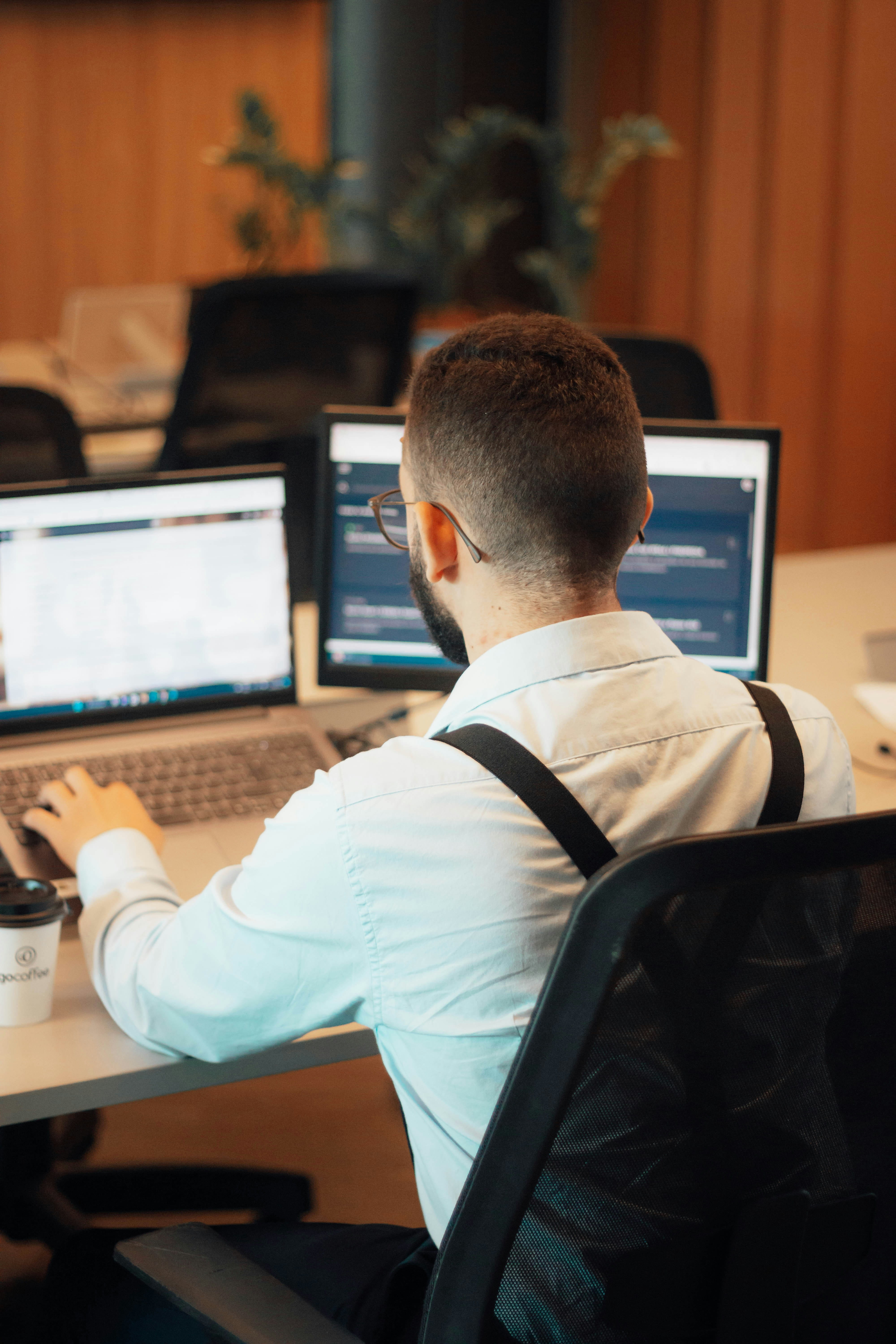 Office management professional working at a computer